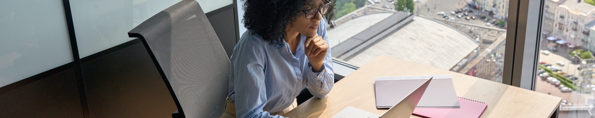 serious-african-american-businesswoman-working-using