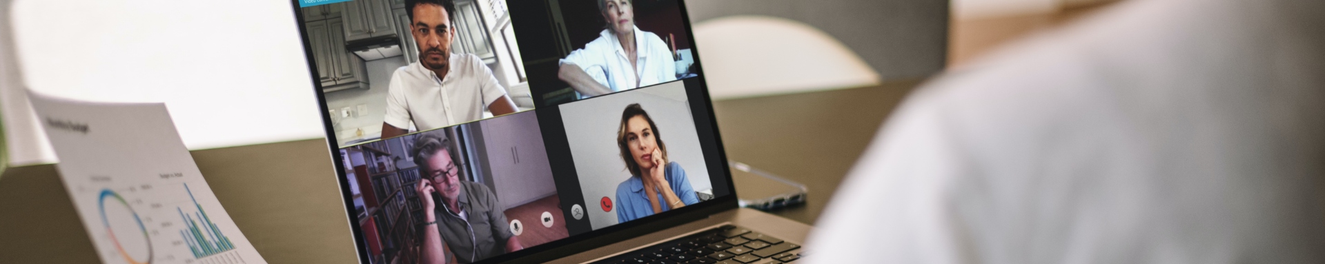 woman-discussing-business-with-team-over-a-video-call